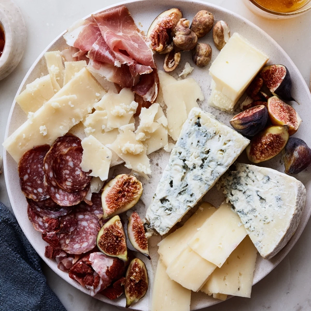 Beautifully arranged Wine & Food Pairing Platter, featuring cheeses, meats, fresh fruits, and nuts to savor.