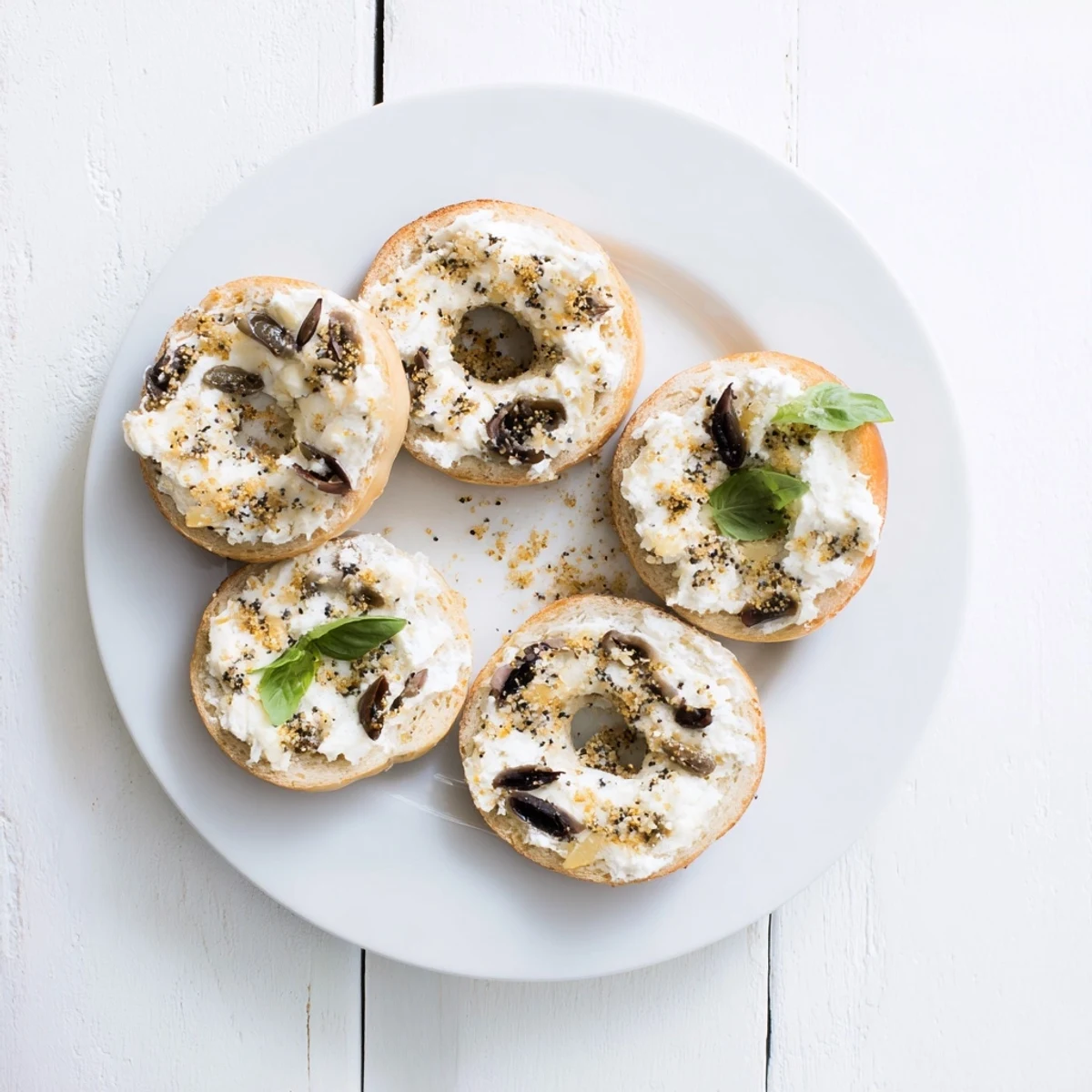 Colorful Olympic Rings Medal Appetizer, featuring mini bagels with vibrant cream cheese toppings for a festive treat.