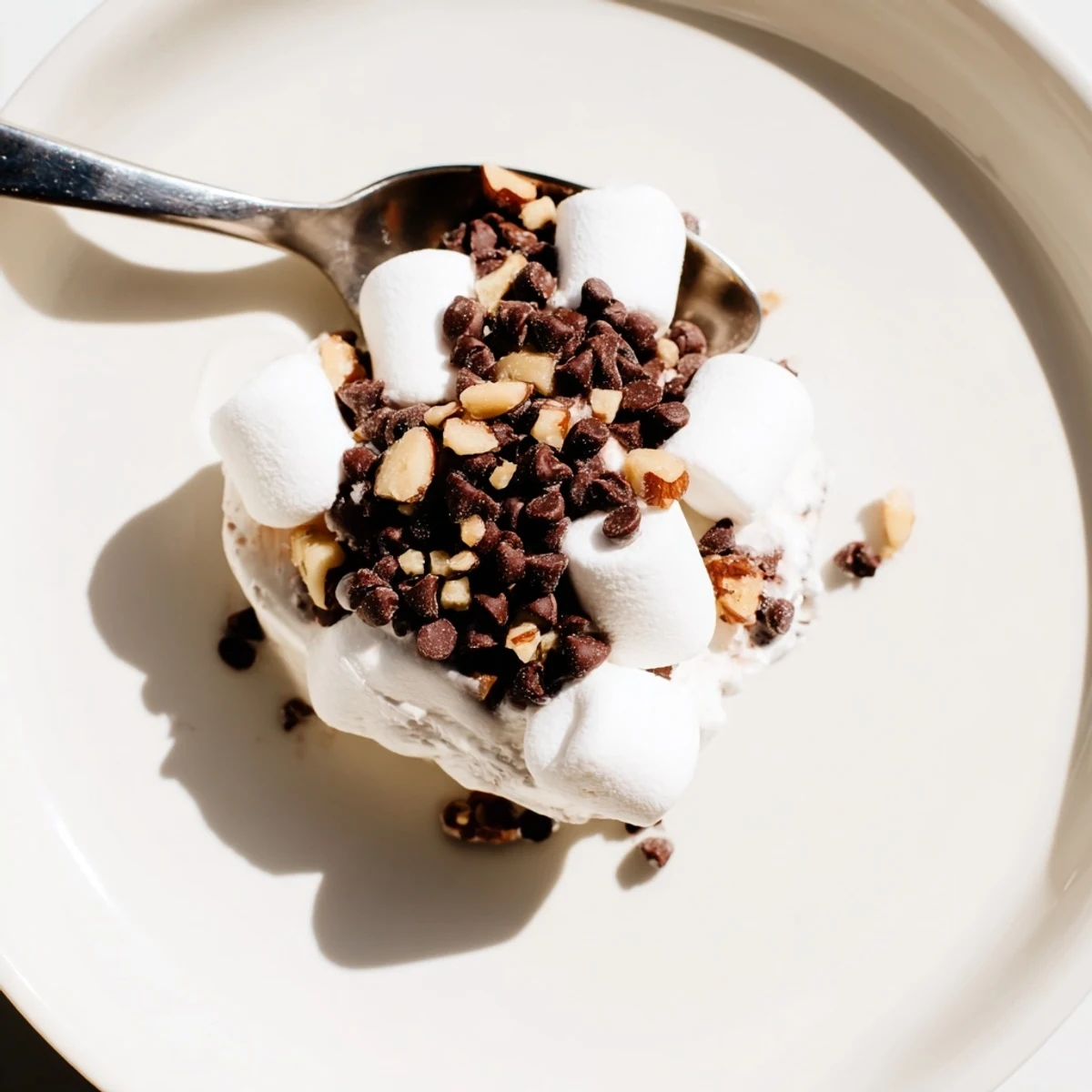 Warm, gooey Quick Dessert: Chocolate Chips and Mini Marshmallows, ready to eat with a spoon.