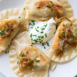 Imagine the soft, pillowy texture of these Polish pierogi, filled with creamy cheese and potato.
