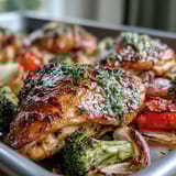 Quick and easy sheet pan dinner featuring juicy chicken breasts and colorful vegetables, perfect for busy weeknights.  