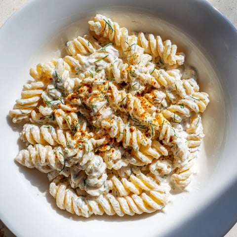 A creamy bowl of Turkish Yogurt Pasta, with spiced butter glistening over tender fusilli.
