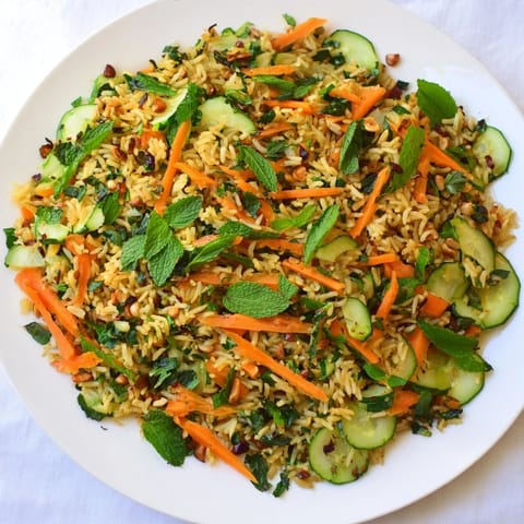 Zesty crispy cucumber rice salad: a vibrant, Asian-inspired salad featuring fresh lime.