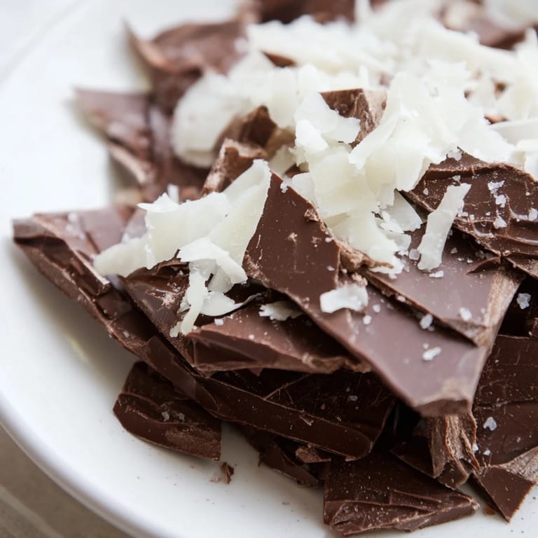 Delectable Arctic Tundra: crisp white chocolate "ice sheets" and savory parmesan, ready to enjoy.