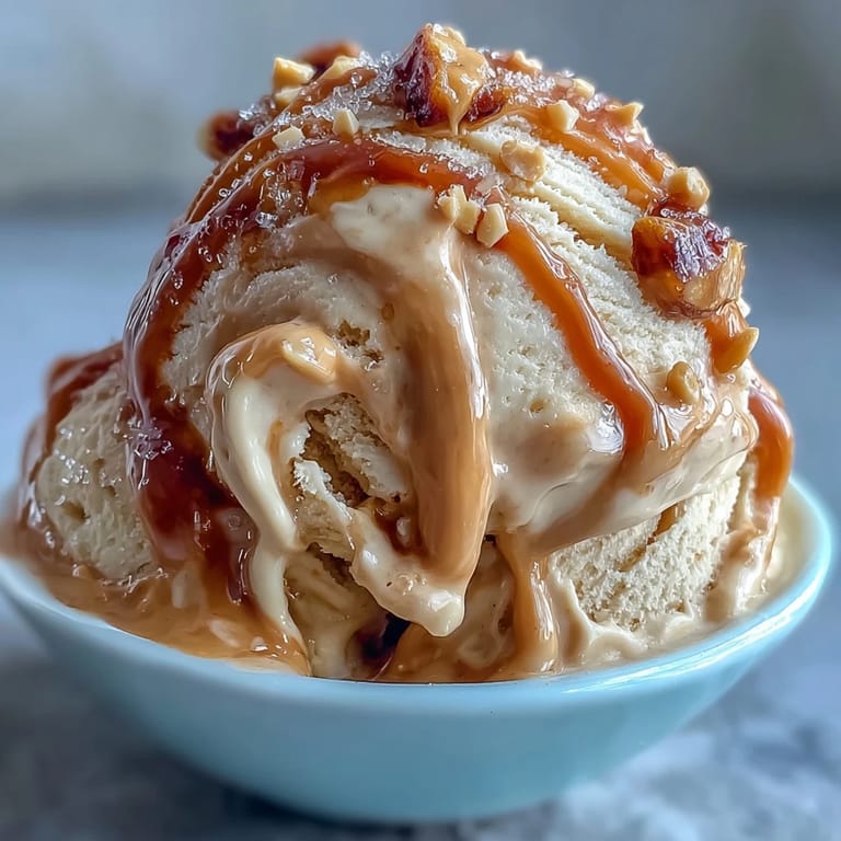 Four-ingredient peanut butter banana ice cream served in chilled bowls with fresh banana slices.  